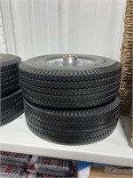 PAIR OF 4.10/3.50 FOAM FILLED TIRES AND WHEELS