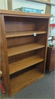 Wood bookcase with 3 adjustable shelves
58" tall
