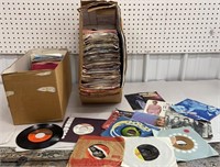 2 boxes mixed genre 45’s records