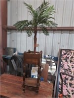 Palm tree in plant stand