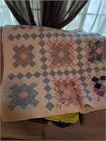 Granny square quilt w some pulling handstitched