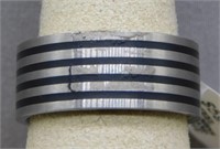 Stainless steel band, size 8.