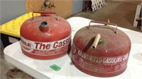 Two metal gas cans