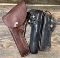 3 Leather holsters          (P 1100)