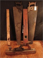 Very old woodworking tools saws, level plane