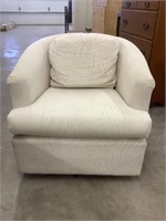 Cream colored, swivel barrel, chair, shipping