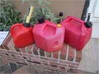 3 Gas Cans ( one has some gas )
