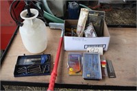 box of misc , squeege, sprayer