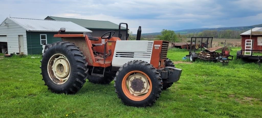 FIAT 580DT Hesston tractor-  with roll bar