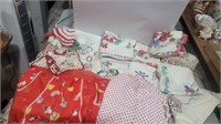 Lot of vintage dish towels, dollies and aporns