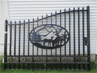 Rod iron deer and mountain scene entrance gate,