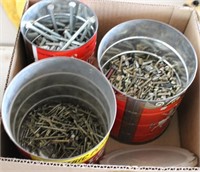 Three cans  of nails,bolts and nuts