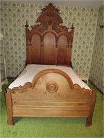 Ornate style walnut bed