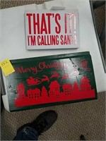 2 small holiday signs