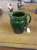 Antique green pottery milk pitcher