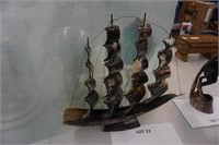 tall sailing ship carved from horn