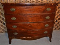 Ca. 1820 Mahogany veneer bow front chest of four d