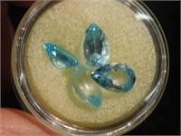 Four Blue Topaz Teardrop gem stones - 3 are 10mm