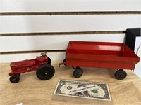 Vintage toy farm tractor and wagon