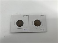 Two 1914 S Wheat cents grades between an 8 and a 1