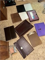 pocket file, notebook paper, clip board, coin