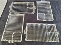 4 glass luncheon trays. Each is 11×6.