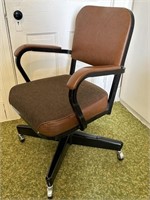 Vintage office chair on rollers