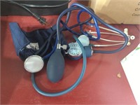 Vintage blood pressure cuff and stethoscope