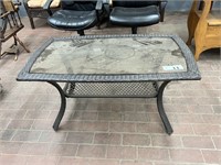 GLASS AND WICKER PATIO COFFEE TABLE