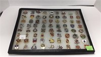70+ U.S. military unit pins in riker display case