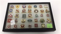 Riker case display of U.S. Military unit pins