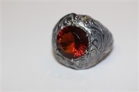 A Sterling and Red Stone Ring