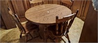 NICE KITCHEN TABLE W/2 LEAVES, 4 HEAVY CHAIRS.