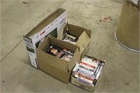 (4) Boxes Of  DVD's And VHS Tapes