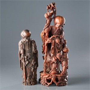 TWO CARVED CHINESE IMMORTALS