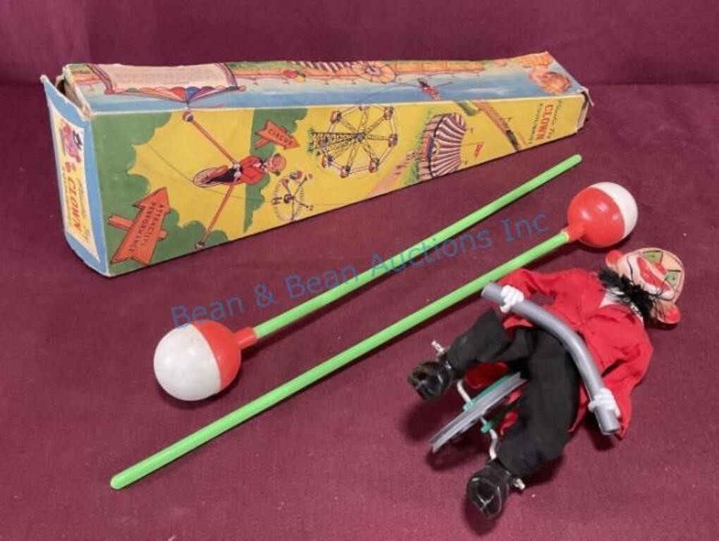 Toy clown high wire balance in box