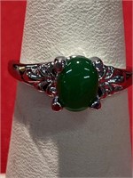 Jade ring. Silver tone setting. Size 7.