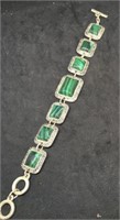 Silver Tone Bracelet With Square Green Stones