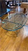 COFFEE TABLE W/ BRASS BASE & SHAPED GLASS TOP