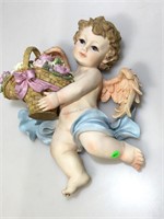 14 in ceramic angel with basket.