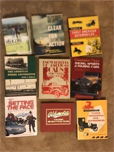 Table top books mixture cars trains and war