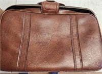 Two VTG MCM Leather Suit Cases