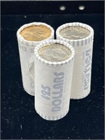 3 $25 rolls of Sacajawea golden U.S. dollars