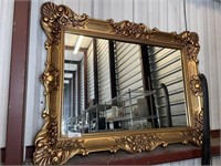 Vintage ornate plastic framed mirror