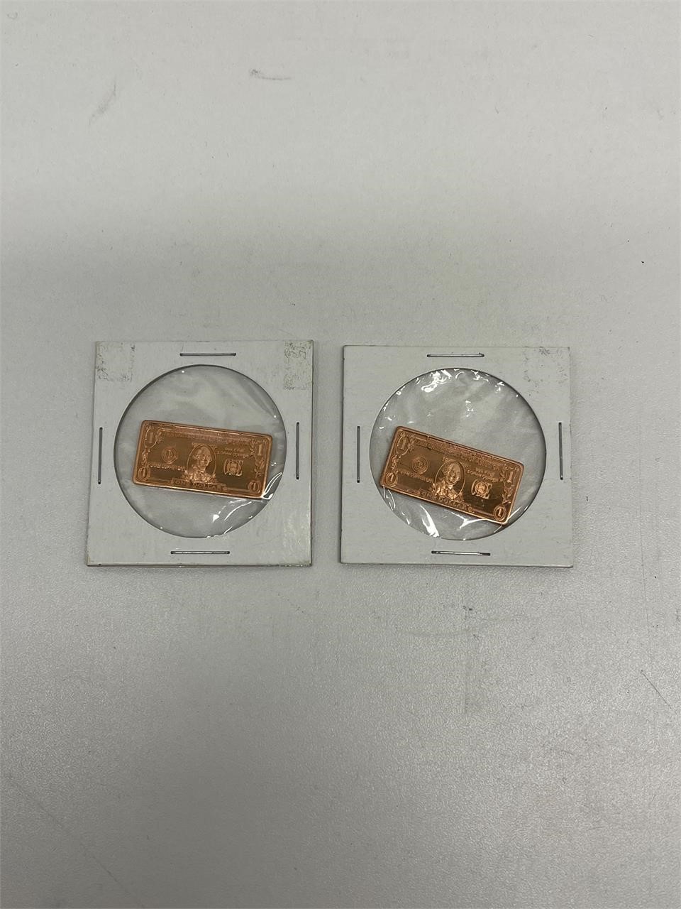 2 US one dollar copper bar
