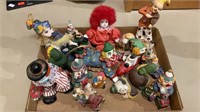 Box  lot with 16 small clown decorations -