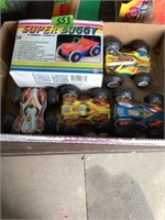 4 -4 x 4 race cars
Super buggy new in the box