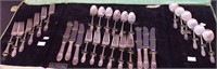 A 30-piece set of sterling silver flatware,