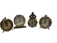 Four Small Table Alarm Clocks