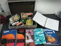 BRIEF CASE W/GUITAR BOOKS,STRINGS,CABLE,ETC
